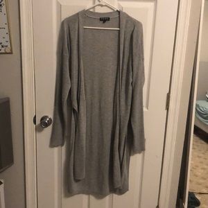 Duster sweater with knitted sleeves